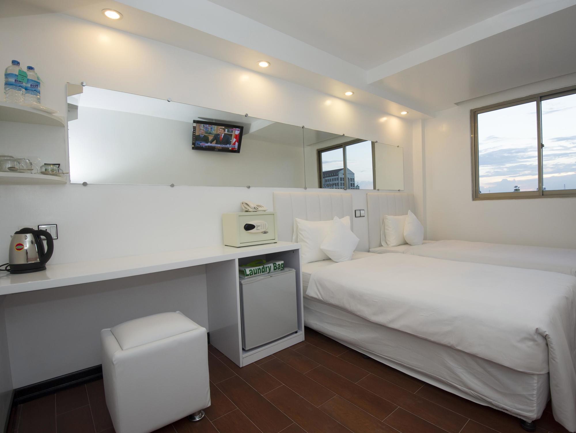 Clover City Center Hotel Rangum Exterior foto