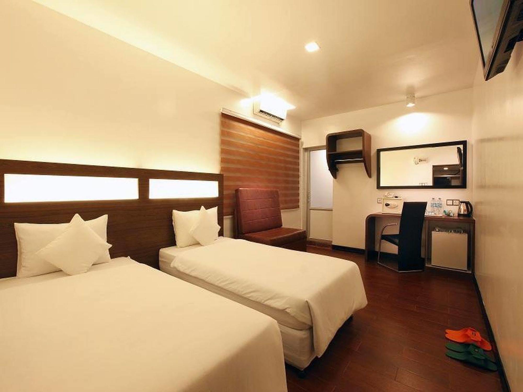 Clover City Center Hotel Rangum Exterior foto