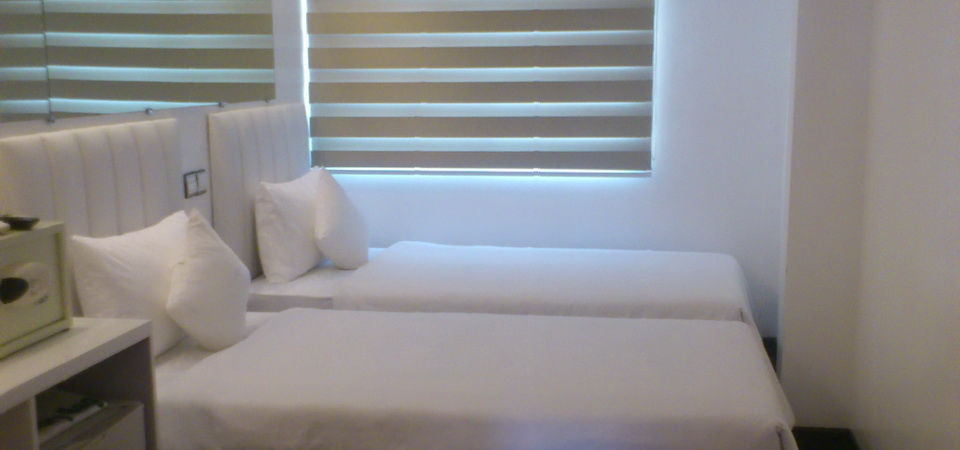 Clover City Center Hotel Rangum Exterior foto