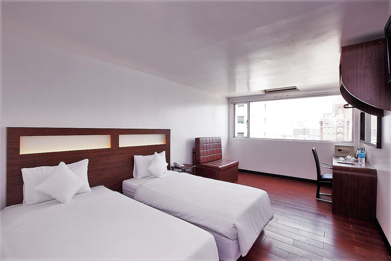 Clover City Center Hotel Rangum Exterior foto
