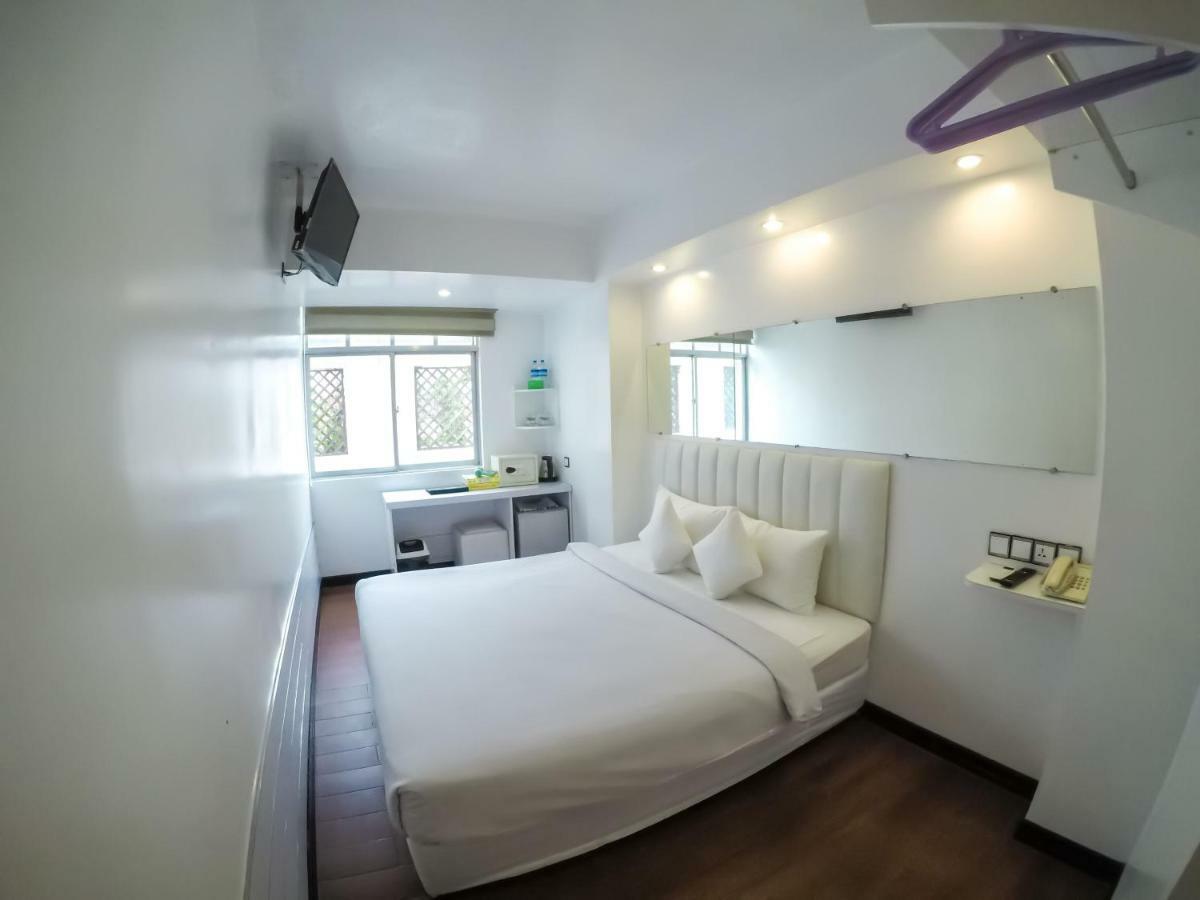 Clover City Center Hotel Rangum Exterior foto