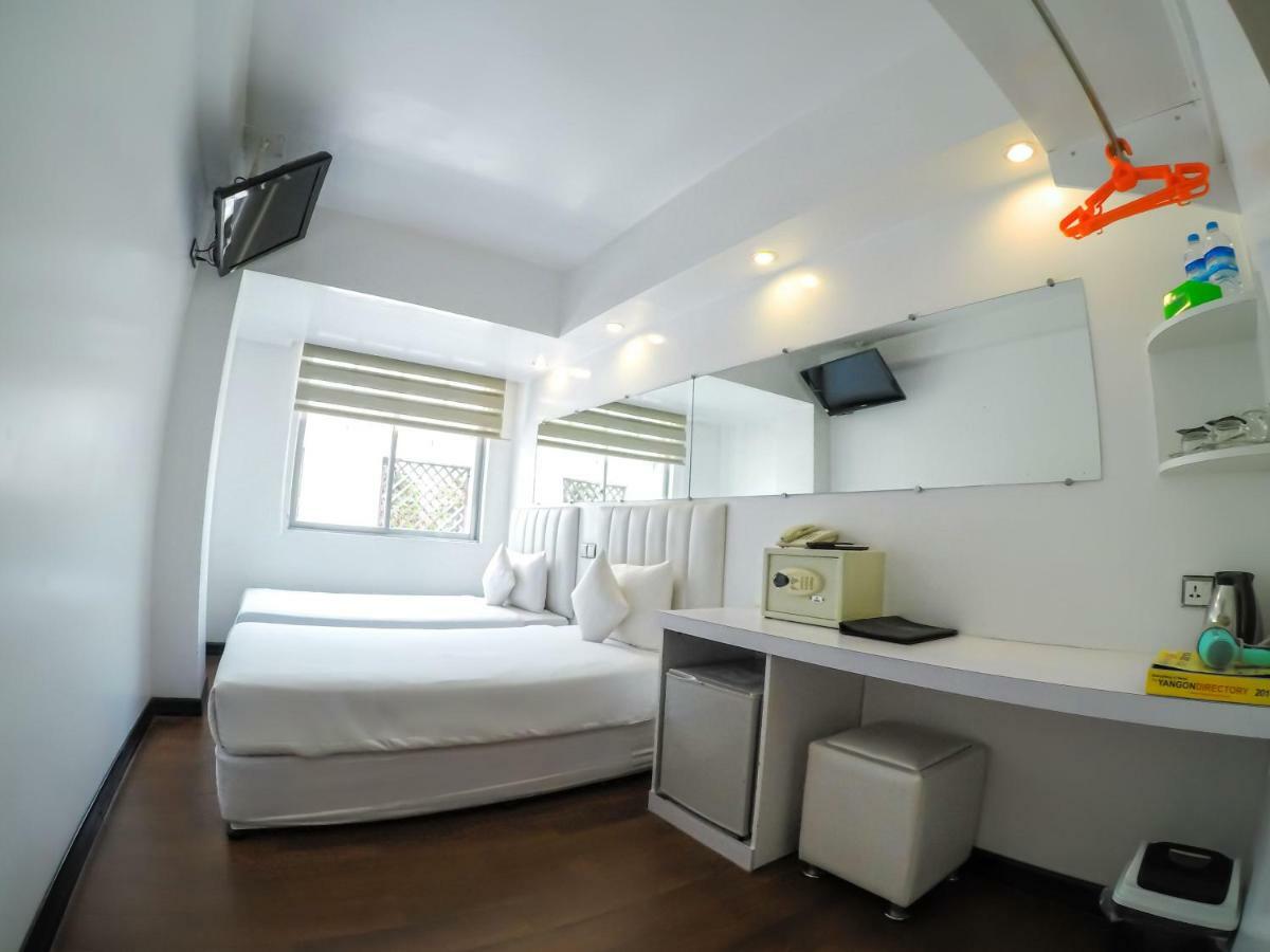 Clover City Center Hotel Rangum Exterior foto